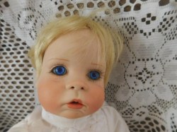 porcelain baby doll white gown face